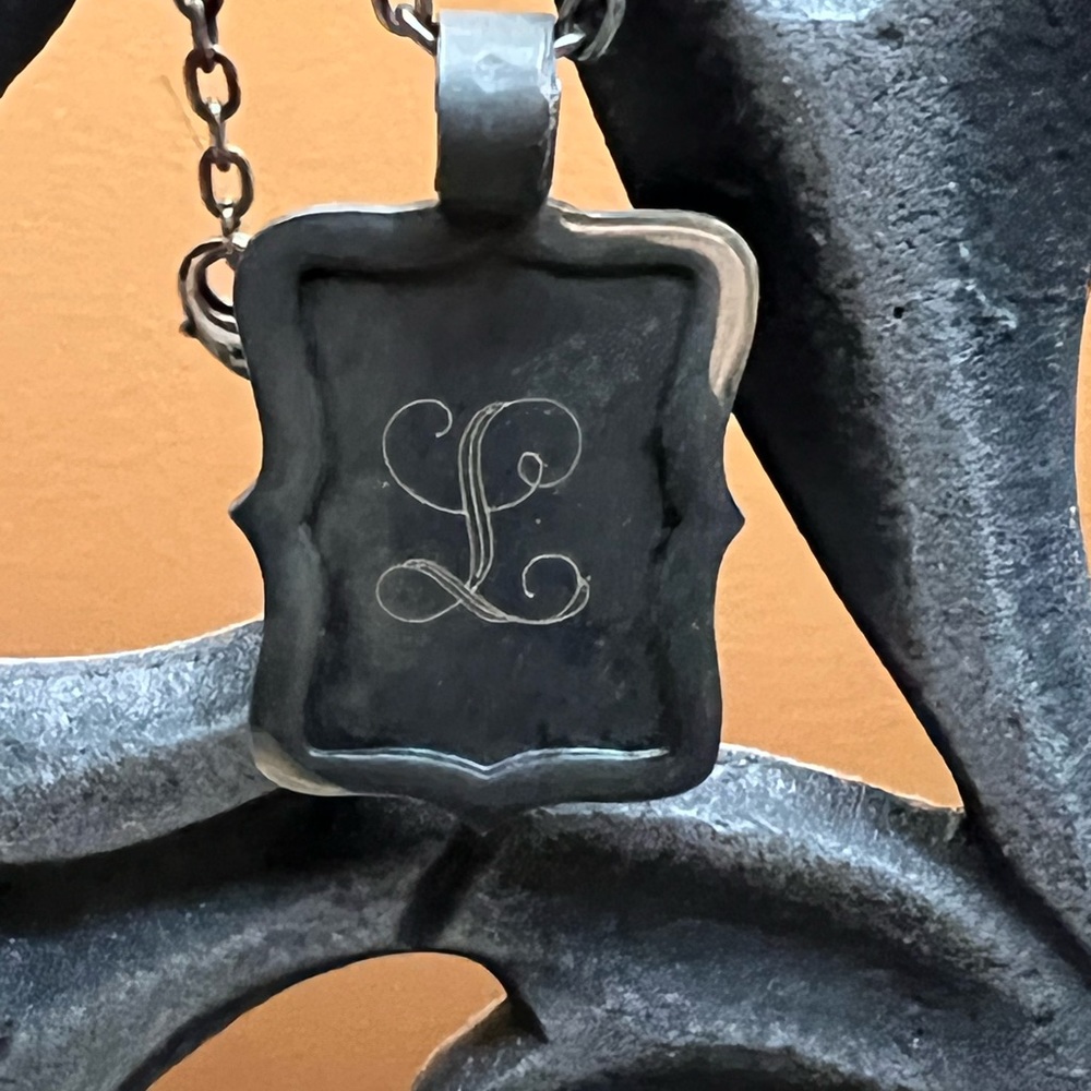 Initial Outfitters Sterling Silver "L" pendant on a 20" matching chain.